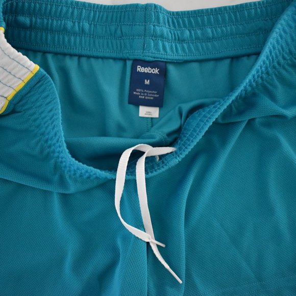 Reebok teal athletic shorts with yellow and white mesh stripes Y2K vibes - Picture 3 of 4